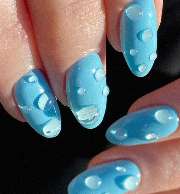 manicura nailt en relieve azules